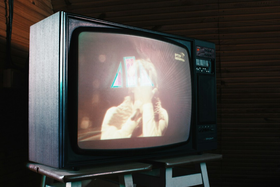 person watching old tv